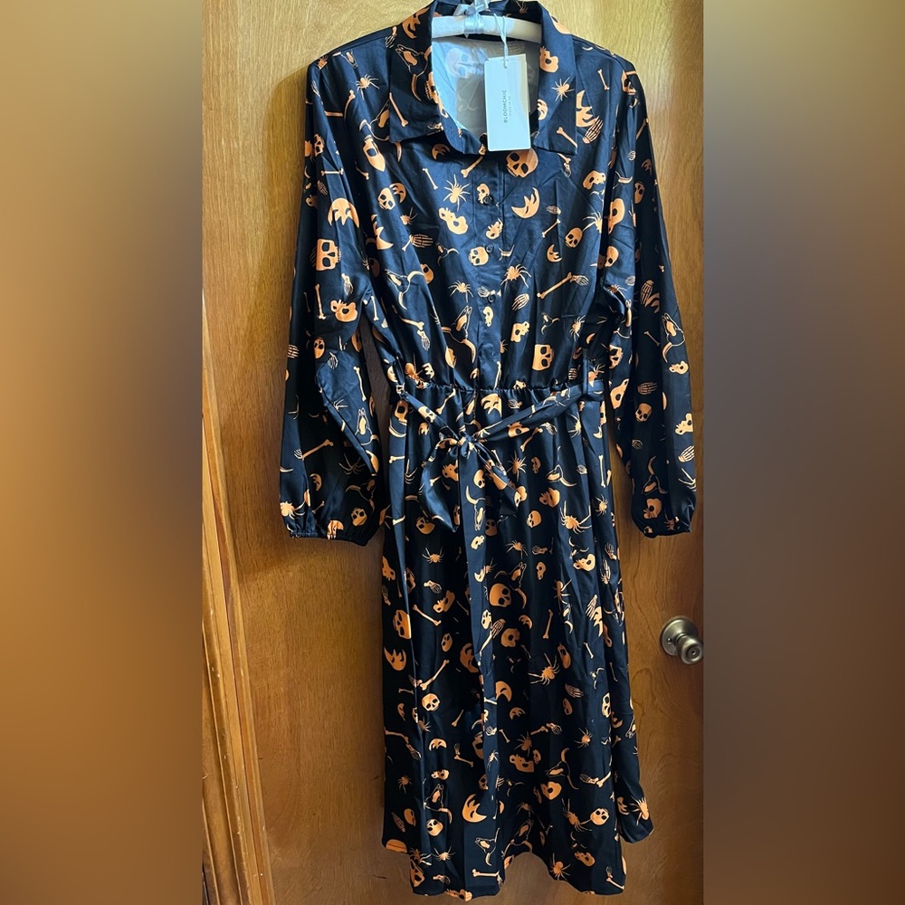 BloomChic Black Dress with Orange Skull Print
